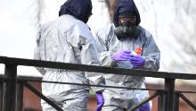 Personnel bag samples as they swab railings near a bench covered in a protective tent at The Maltings shopping centre in Salisbury, southern England, on March 16, 2018, as investigations and operations continue in connection with the major incident sparked after a man and a woman were apparently poisoned in a nerve agent attack in Salisbury on March 4.
NATO Secretary General Jens Stoltenberg said March 16, the alliance did not want a return to Cold War hostilities with Russia while expressing support for Britain's strong stance on the nerve agent attack. / AFP PHOTO / Ben STANSALL        (Photo credit should read BEN STANSALL/AFP/Getty Images)