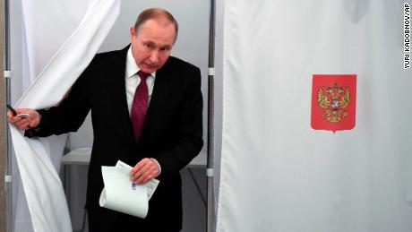 Russia&#39;s Vladimir Putin retains grip on power, exit poll shows