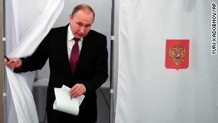 Putin tightens grip on power with overwhelming Russian election win