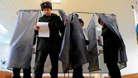 Russian soldiers vote in Rostov-on-Don, Russia on Sunday.