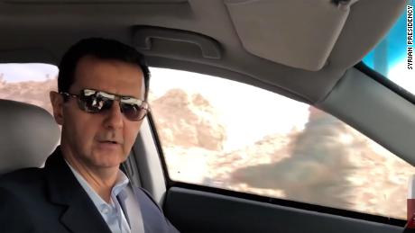 Syrian President Bashar al Assad drives through newly recaptured parts of Eastern Ghouta. 