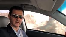 Syrian President Bashar al Assad drives through newly recaptured parts of Eastern Ghouta. 