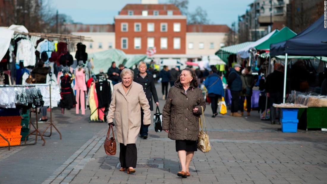 People stroll through Romford Market on Wednesday, March 14.