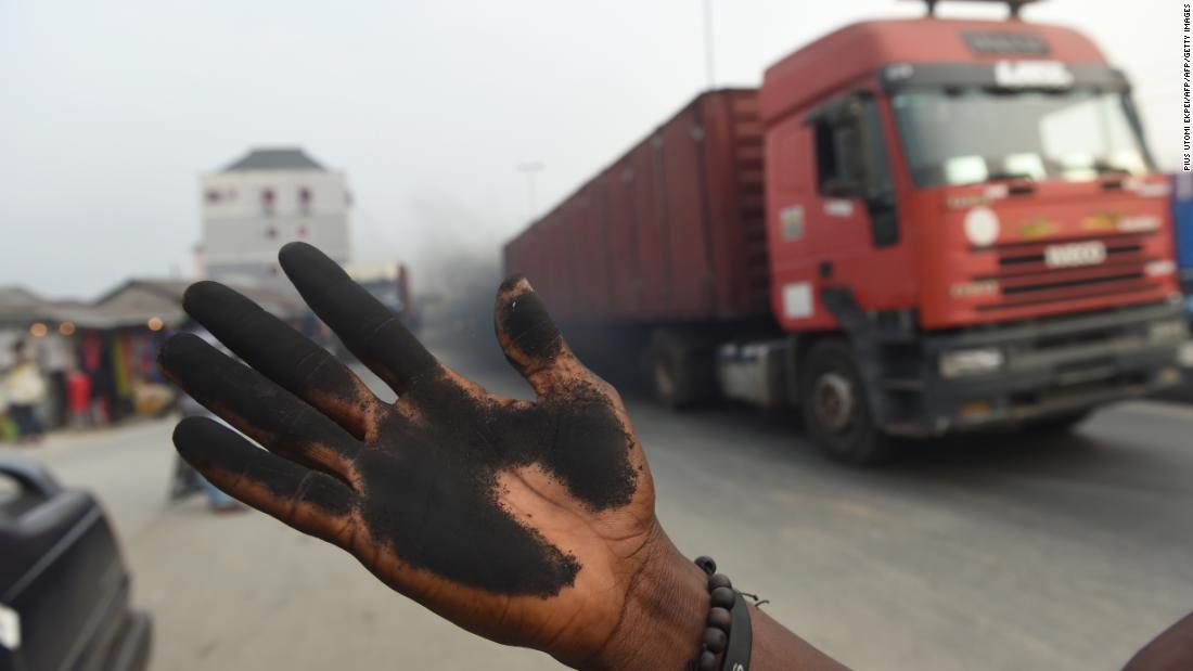 A soot-covered hand. 
