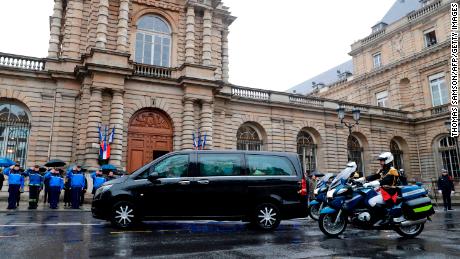 Republican Guards escort the hearse transporting the coffin of  Lt. Col.  Arnaud Beltrame.