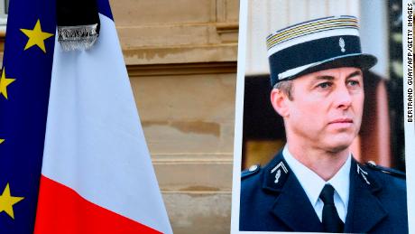 A portrait of Beltrame is pictured during  a minute of silence at the Interior Ministry in Paris. 