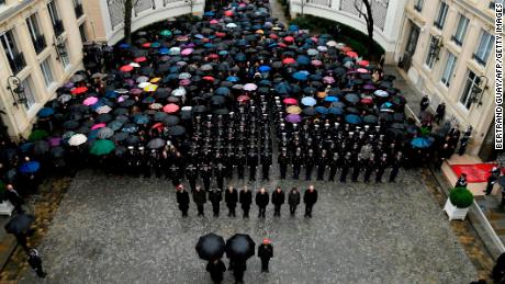 A minute of silence is held for  Beltrame at the Interior Ministry in Paris. 