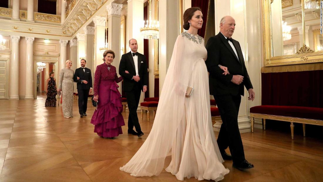 Catherine is escorted to dinner by Norwegian King Harald V during a visit to Norway in February 2018. William is escorted by Norway&#39;s Queen Sonja.