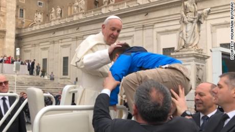 A 12-year-old boy got a kiss from the Pope and a ride in the Popemobile on March 28.