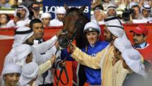 Sheikh Hamdan bin Mohammed bin Rashid al-Maktoum (2nd-L), Crown Prince of Dubai, poses for picture with his father Sheikh Mohammed bin Rashid al-Maktoum (C-R), Vice-President and Prime Minister of the UAE and Ruler of Dubai, and Jockey Christophe Soumillon (C) and horse Thunder Snow after winning the Dubai World Cup horse race at the Dubai World Cup in the Meydan Racecourse on March 31, 2018 in Dubai. / AFP PHOTO / Giuseppe CACACE        (Photo credit should read GIUSEPPE CACACE/AFP/Getty Images)