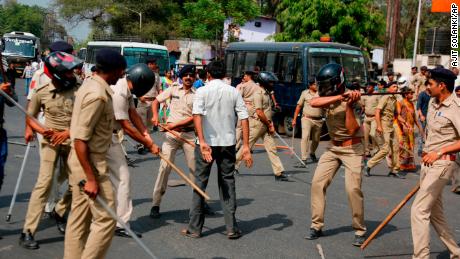 Police beat a lower-caste Dalit man in Ahmadabad on Monday as demonstrations spread.