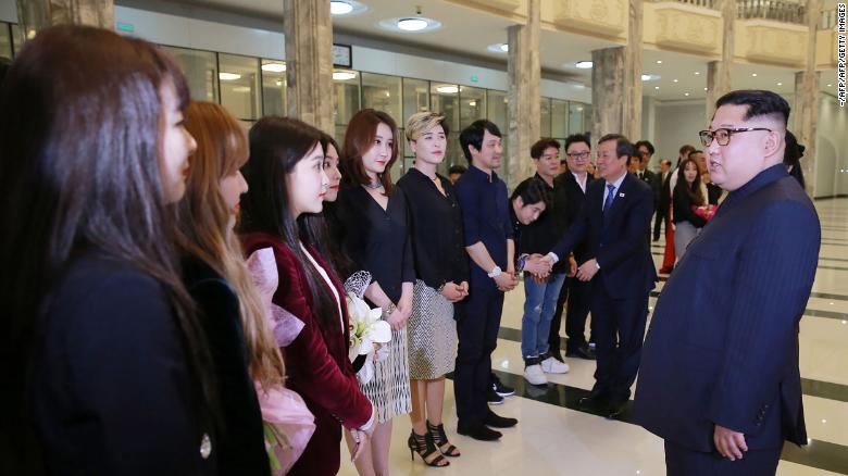 North Korean leader Kim Jong-Un speaks to South Korean musicians after the concert, in this photo released from North Korea&#39;s official Korean Central News Agency (KCNA).