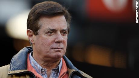 NEW YORK, NEW YORK - OCTOBER 17: Former Donald Trump presidential campaign manager Paul Manafort looks on during Game Four of the American League Championship Series at Yankee Stadium on October 17, 2017 in the Bronx borough of New York City. (Photo by Elsa/Getty Images)