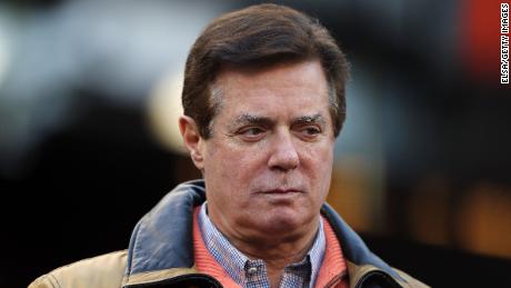 NEW YORK, NEW YORK - OCTOBER 17: Former Donald Trump presidential campaign manager Paul Manafort looks on during Game Four of the American League Championship Series at Yankee Stadium on October 17, 2017 in the Bronx borough of New York City. (Photo by Elsa/Getty Images)