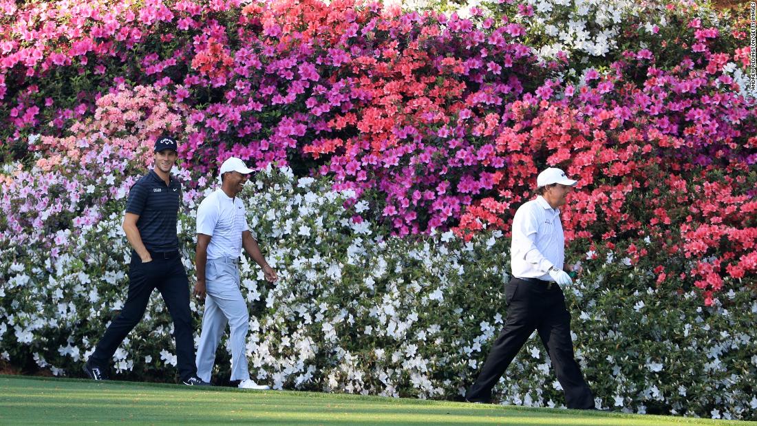 Woods was touted as one of the favorites after impressing in his early-season events. He also set tongues wagging by playing a practice round with old rival Phil Mickelson, right.