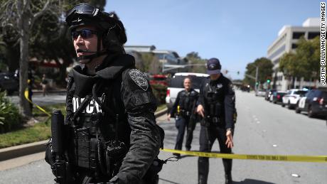 SAN BRUNO, CA - APRIL 03:  Law enforcement stands watch outside of the YouTube headquarters on April 3, 2018 in San Bruno, California. Police are investigating an active shooter incident at YouTube headquarters that has left at least one person dead and several wounded.  (Photo by Justin Sullivan/Getty Images)