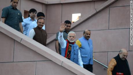 The government of Indian Prime Minister Narendra Modi, center, faced criticism over the measure.