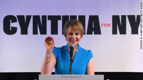 Former Sex and the City star Cynthia Nixon speaks to people at the Bethesda Healing Center in  Brooklyn, New York on March 20, 2018 at her first event since announcing that shes running for governor of New York.
Cynthia Nixon, the US actress who shot to fame as workaholic lawyer Miranda on &quot;Sex and the City,&quot; jumped into the race for New York governor March 19, 2018, unveiling a progressive platform championing economic equality and eschewing big business.The 51-year-old declared her candidacy with a two-minute campaign video posted on Twitter that showed her at home with her wife and children, riding the subway, taking one of her children to school and speaking at liberal political causes.
 / AFP PHOTO / TIMOTHY A. CLARY        (Photo credit should read TIMOTHY A. CLARY/AFP/Getty Images)