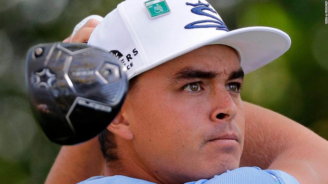 Rickie Fowler hits a drive on the second hole Friday. He was 2-under heading into the weekend.