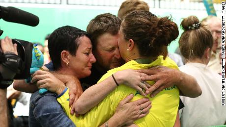 Toomey  celebrates with family and friends after winning the gold medal.