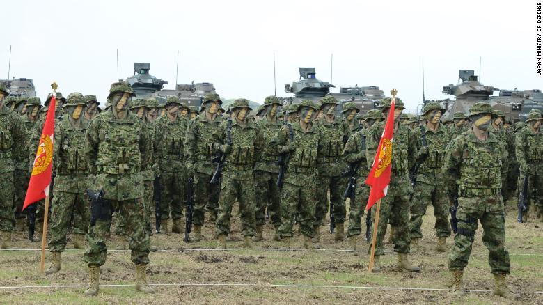 Japan's new amphibious rapid deployment brigade training on Saturday, April 7.