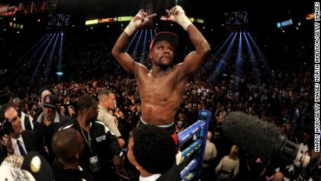 LAS VEGAS, NV - MAY 03:  Floyd Mayweather Jr. celebrates after defeating Marcos Maidana by majority decision in their WBC/WBA welterweight unification fight at the MGM Grand Garden Arena on May 3, 2014 in Las Vegas, Nevada.  (Photo by Harry How/Getty Images)
