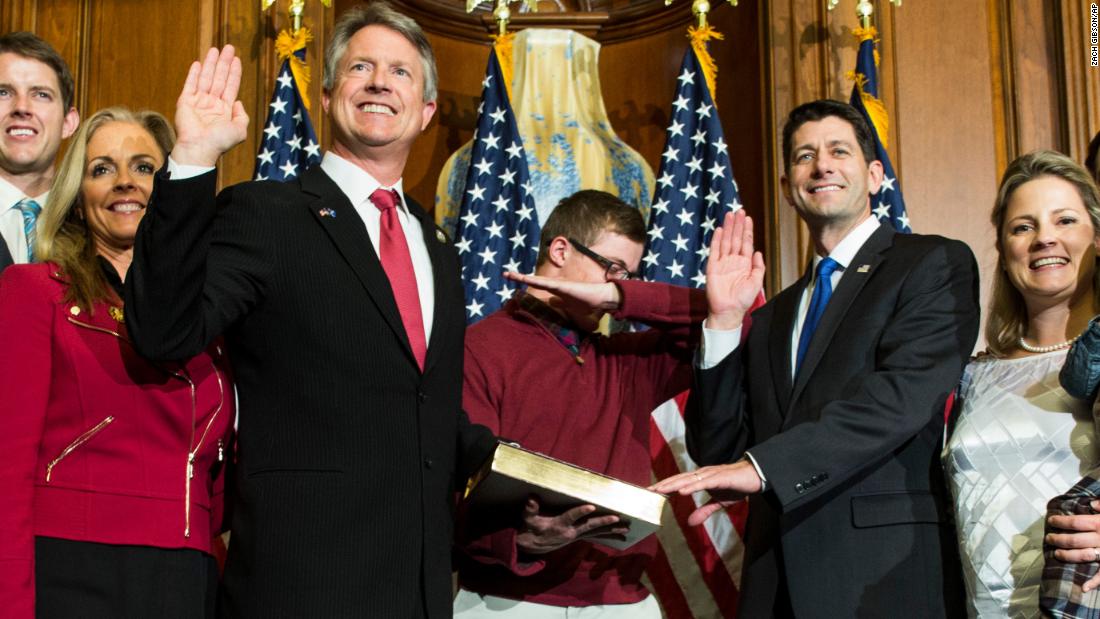 Ryan administers the oath of office to Rep. Roger Marshall in 2017 as one of Marshall&#39;s sons &quot;dabs&quot; during an unofficial ceremony.