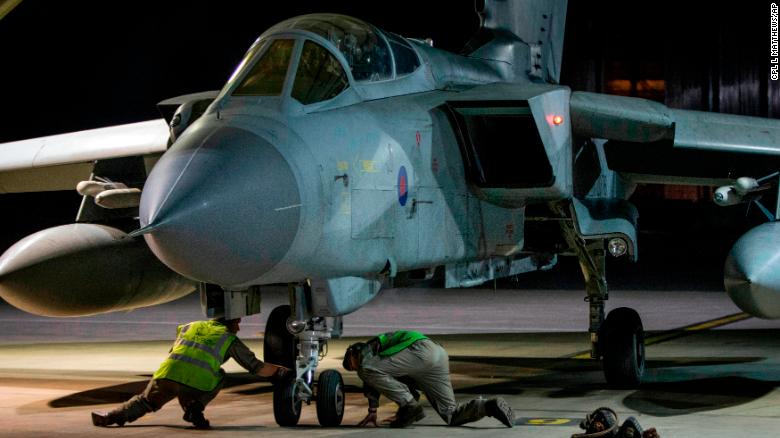 An RAF Tornado taxis into its hangar after landing at the British air force base in Akrotiri, Cyprus, after a Syria strike mission, April 14, 2018.