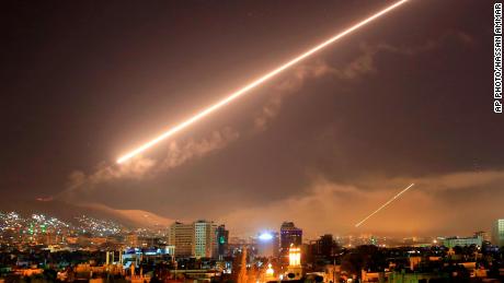Damascus skies erupt with surface to air missile fire as the U.S. launches an attack on Syria targeting different parts of the Syrian capital Damascus, Syria, early Saturday, April 14, 2018. Syria&#39;s capital has been rocked by loud explosions that lit up the sky with heavy smoke as U.S. President Donald Trump announced airstrikes in retaliation for the country&#39;s alleged use of chemical weapons. (AP Photo/Hassan Ammar)