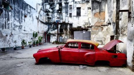 A 1950s American car in the rundown neighborhood of Centro Habana.  (Photo by Patrick Opmann)