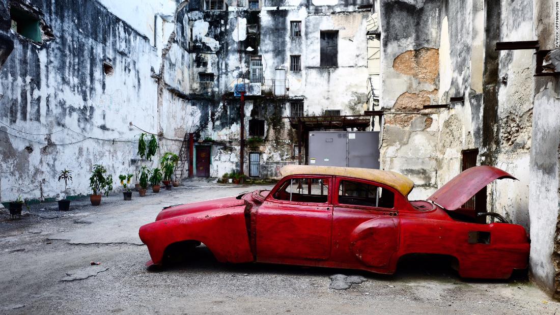 An American car from the 1950s rots in the run-down neighborhood of Centro Habana. Transportation and housing are in short supply in Cuba. Most Cubans still work for the state and barely earn enough to live on, much less afford a luxury item like a car or a better place to live. Cuban officials blame the US trade embargo for Cuba&#39;s economic woes. Critics say government inefficiency and poor planning have kept wages low.