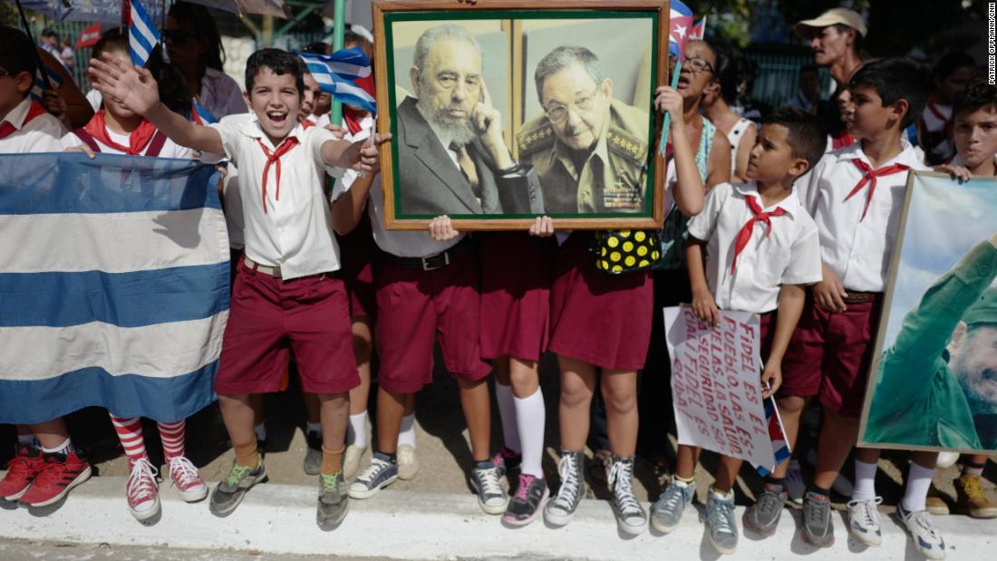 Cuban students greet Fidel Castro&#39;s funeral caravan in 2016 as it traveled through Holguín, Cuba, near where Castro was born. After Castro died at the age of 90, his ashes were driven through the island, retracing the route he took as a young guerrilla leader.  Upon taking power, Castro promised democratic elections but instead stayed in office for nearly 50 years.