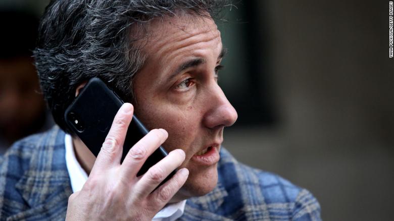 Michael Cohen, U.S. President Donald Trump's personal attorney, takes a phone call as he sits outside near the Loews Regency hotel on Park Ave on April 13, 2018 in New York City. (Yana Paskova/Getty Images)