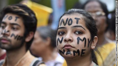 NEW DELHI, INDIA - APRIL 15: People take part in &#39;Not In My Name&#39; protest against the Kathua and Unnao rape cases, at Parliament Street, on April 15, 2018 in New Delhi, India. An 8-year-old nomad girl was raped and murdered in Jammu&#39;s Kathua in January after she was kidnapped and sedated. In the other case, a 17-year-old girl alleged rape by BJP legislator Kuldeep Sigh Sengar and his brother Atul Singh in Uttar Pradesh. The girl&#39;s father died earlier this week after he was allegedly beaten by the men of the rape accused. (Photo by Arvind Yadav/Hindustan Times via Getty Images)