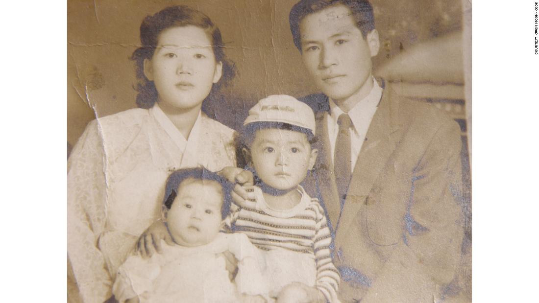 Kwon Moon-kook and his wife and two of his four children.