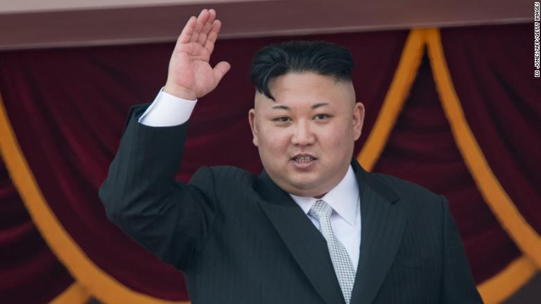 North Korean leader Kim Jong-Un waves from a balcony of the Grand People&#39;s Study house following a military parade marking the 105th anniversary of the birth of late North Korean leader Kim Il-Sung, in Pyongyang on April 15, 2017. Kim saluted as ranks of goose-stepping soldiers followed by tanks and other military hardware paraded in Pyongyang for a show of strength with tensions mounting over his nuclear ambitions. / AFP PHOTO / ED JONES (Photo credit should read ED JONES/AFP/Getty Images)