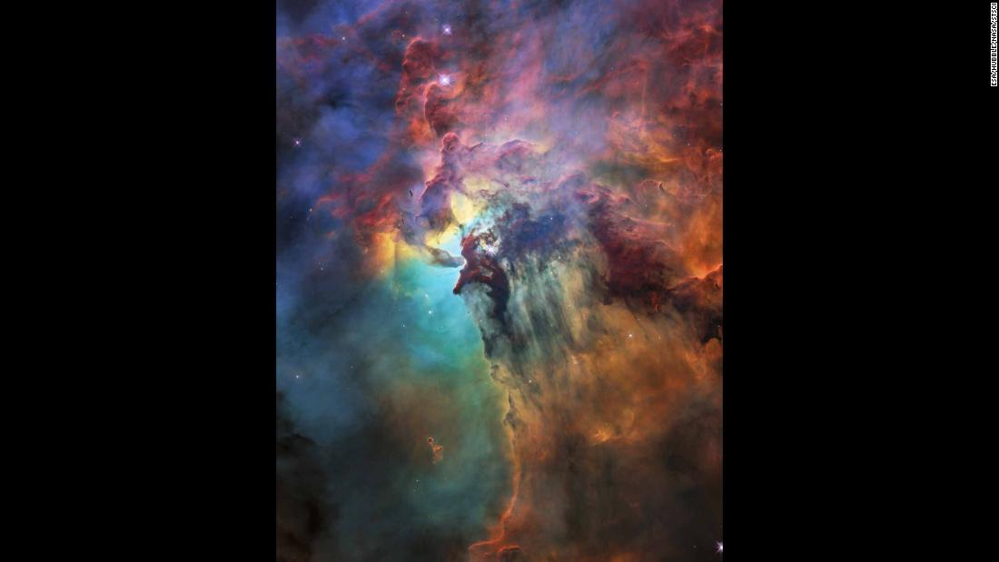 The NASA/ESA Hubble Space Telescope is celebrating its 28th anniversary in space with this stunning and colorful image of the Lagoon Nebula 4,000 light-years from Earth. While the whole nebula is 55 light-years across, this image only reveals a portion of about four light-years. 