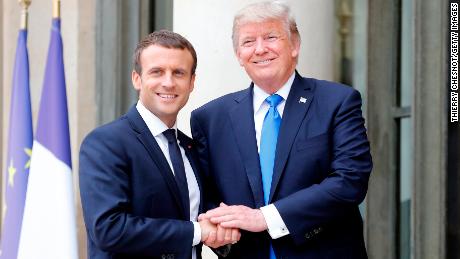 PARIS, FRANCE - JULY 13:  French President Emmanuel Macron welcomes US President Donald Trump prior to a meeting at the Elysee Presidential Palace on July 13, 2017 in Paris, France. As part of the commemoration of the 100th anniversary of the entry of the United States of America into World War I, US President, Donald Trump will attend tomorrow at the Bastille Day military parade.  (Photo by Thierry Chesnot/Getty Images)
