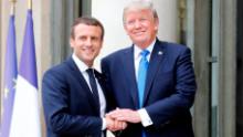 PARIS, FRANCE - JULY 13: French President Emmanuel Macron welcomes US President Donald Trump prior to a meeting at the Elysee Presidential Palace on July 13, 2017 in Paris, France. As part of the commemoration of the 100th anniversary of the entry of the United States of America into World War I, US President, Donald Trump will attend tomorrow at the Bastille Day military parade. [Photo by Thierry Chesnot/Getty Images)