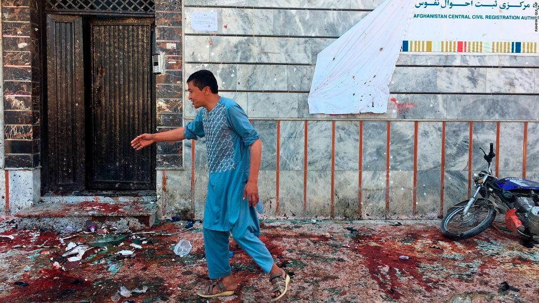 Suicide blast hits Afghan voter registration center, killing dozens