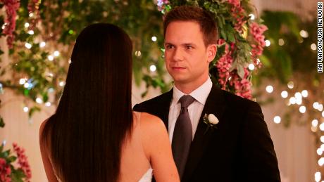 Mike (Patrick J. Adams) and Rachel (Meghan Markle) make it official.