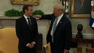 Trump brushes off Macron&#39;s &#39;dandruff&#39;