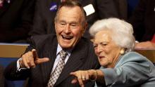 ST. PAUL, MN - SEPTEMBER 02:  Former President George H.W. Bush (L) and former first lady Barbara Bush (C) point from their seats on day two of the Republican National Convention (RNC) at the Xcel Energy Center on September 2, 2008 in St. Paul, Minnesota. The GOP will nominate U.S. Sen. John McCain (R-AZ) as the Republican choice for U.S. President on the last day of the convention.  (Photo by Justin Sullivan/Getty Images)