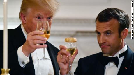 Trump jets to Paris, leaving political tumult behind