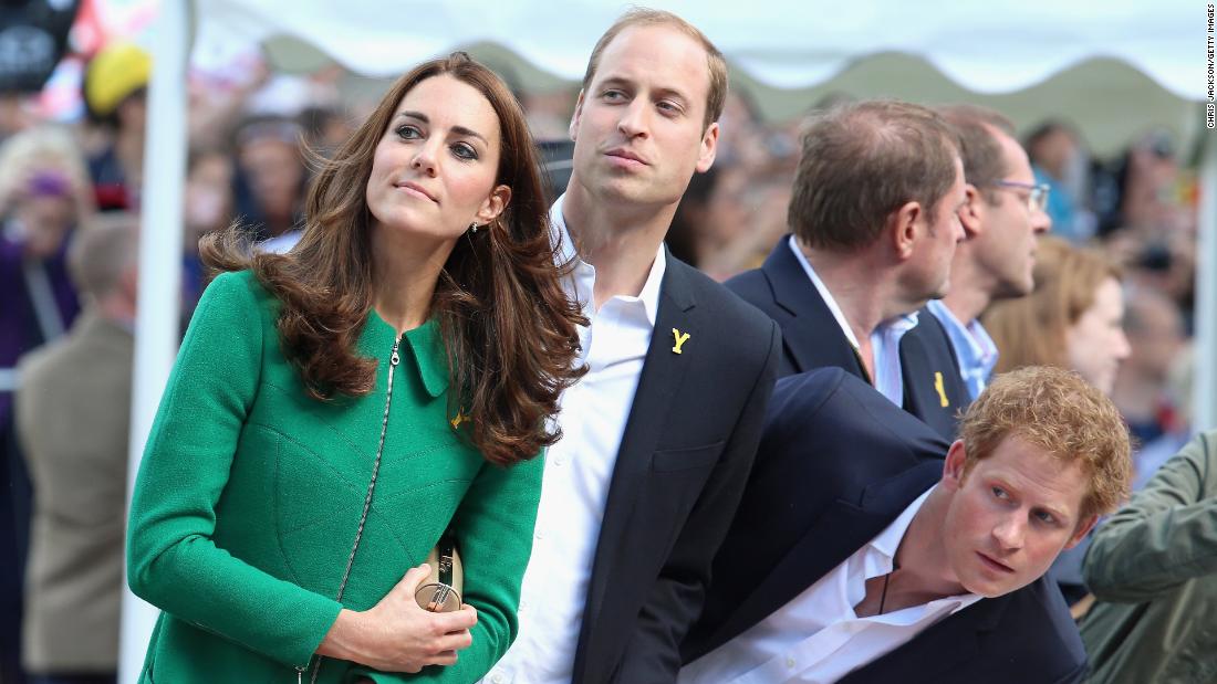 Alongside the Duke and Duchess of Cambridge, Prince Harry watches for the riders at the finish of the first stage of the 2014 Tour de France. The three young royals &quot;seem to get on very well,&quot; says Jackson. Harrogate, UK, July 2014.