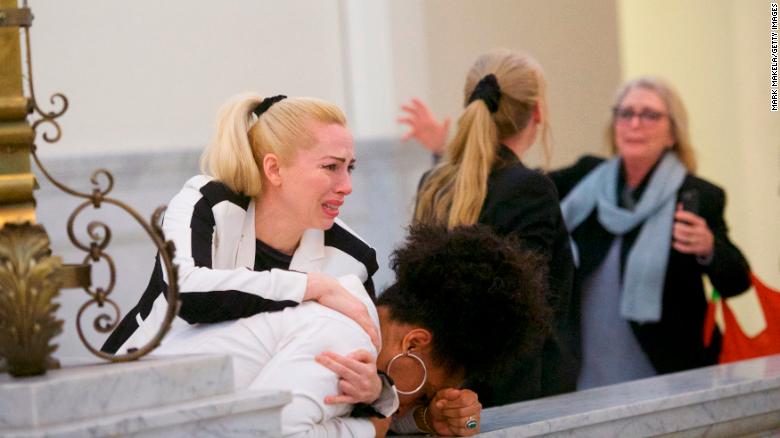 Bill Cosby accusers Caroline Heldman, left; Lili Bernard, center; and Victoria Valentino react outside the court house after the guilty verdict was announced.