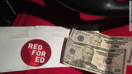 A stranger gave a Colorado grocery cashier $100 when he learned she's also a 3rd-grade teacher
