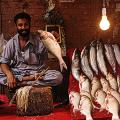Pakistan adventure travel secret fish man