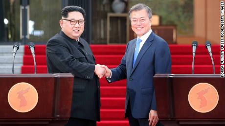 PANMUNJOM, SOUTH KOREA - APRIL 27:  North Korean leader Kim Jong Un (L) and South Korean President Moon Jae-in (R) shake hands after announcing the Panmunjom Declaration for Peace, Prosperity and Unification of the Korean Peninsula during the Inter-Korean Summit in front of the Peace House on April 27, 2018 in Panmunjom, South Korea. Kim and Moon meet at the border today for the third-ever Inter-Korean summit talks after the 1945 division of the peninsula, and first since 2007 between then President Roh Moo-hyun of South Korea and Leader Kim Jong-il of North Korea.  (Photo by Korea Summit Press Pool/Getty Images)