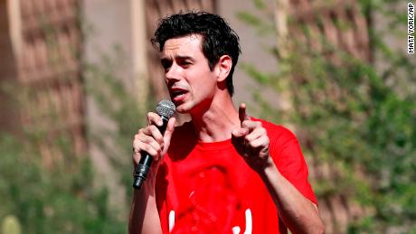 Music teacher Noah Karvelis addresses supporters at the Capitol in Phoenix on Friday.